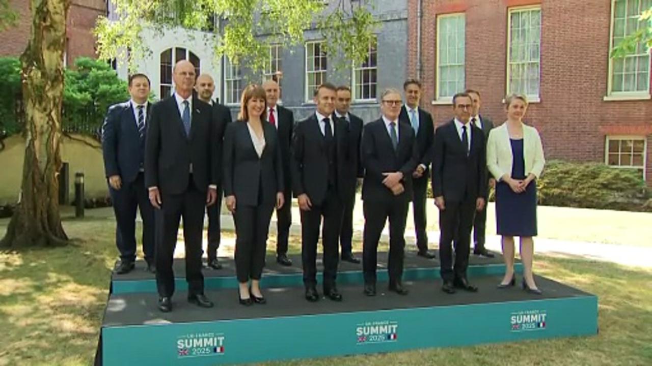 Leaders meet for family photo at UK-France summit