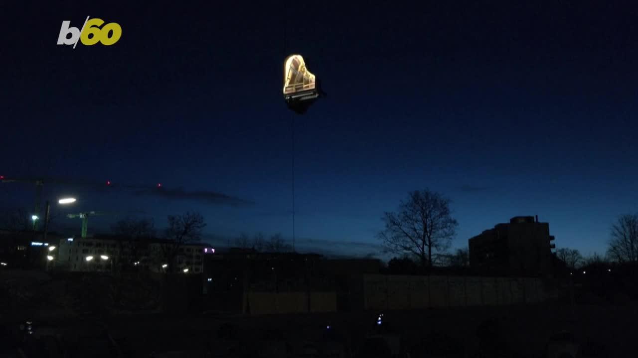 This Insane Video Shows a Musician Playing a Piano Vertically Hanging From a Crane