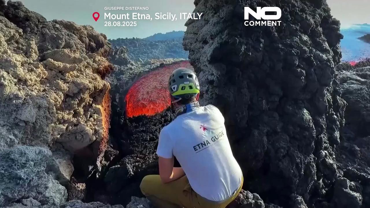 Mount Etna glows with lava as eruptions light the night sky